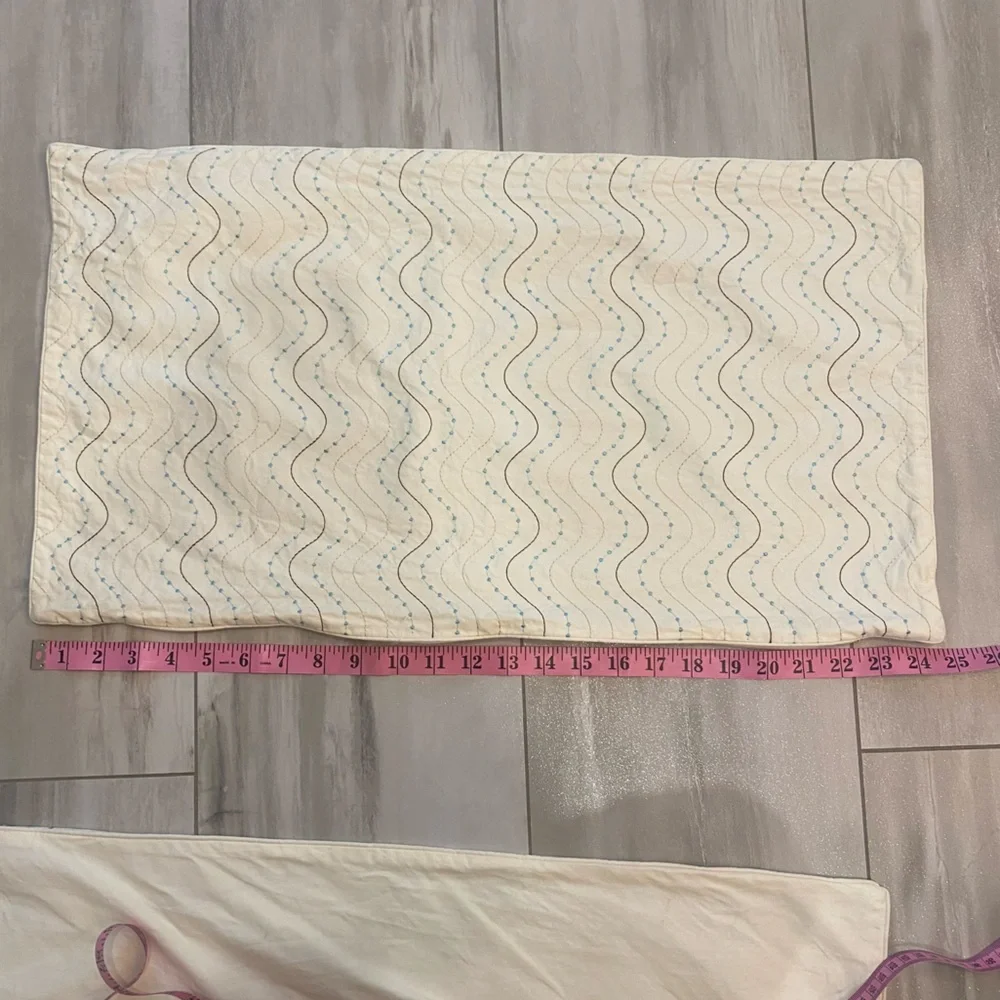 Pair of Cream Rectangle Lumbar Pillows with Blue and Tan Decorative Embroidery